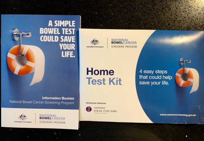 File:Bowel cancer Home Test Kit package in Australia.jpg - two books on a table